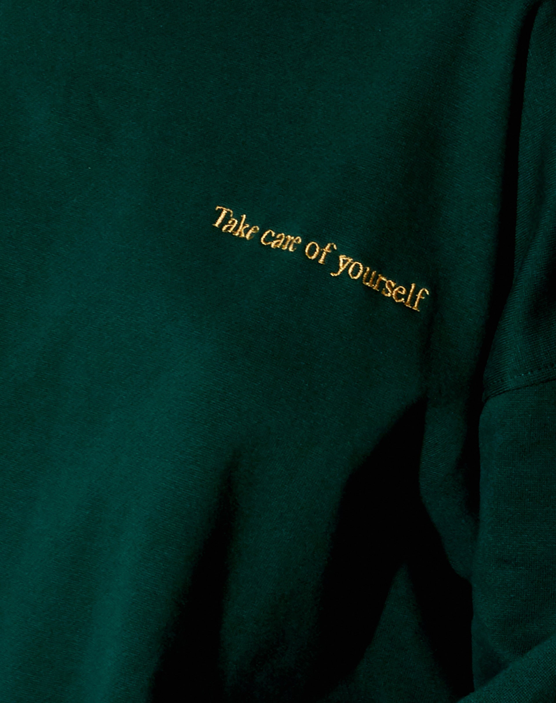 Glo Sweatshirt in Bottle Green with 'Take Care Of Yourself' Embro