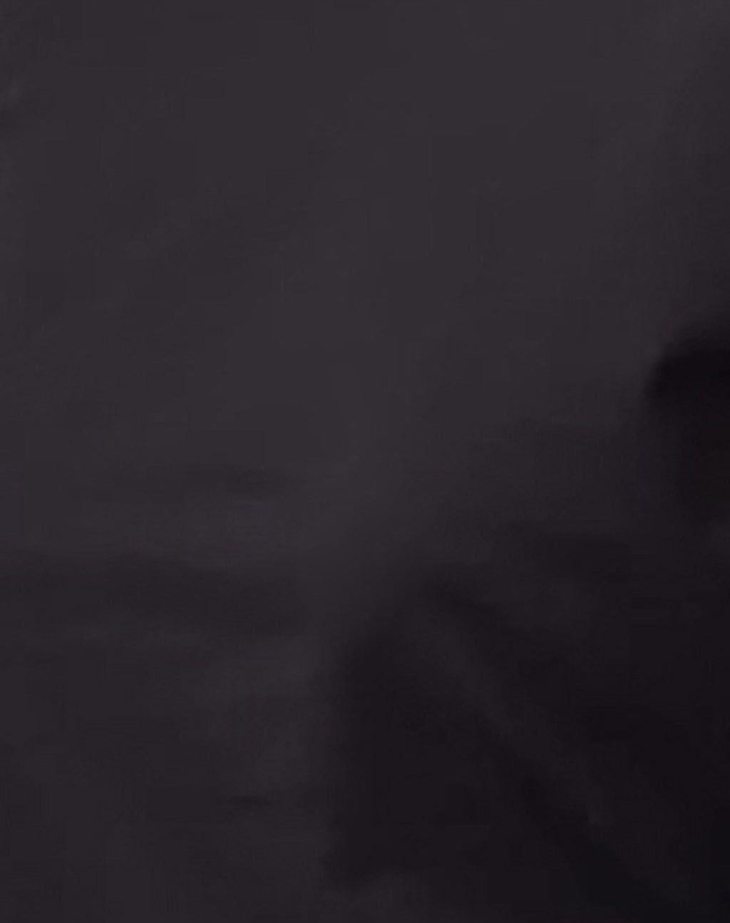 Ledez Asymmetrical Slouchy Top in Black Tissue Jersey