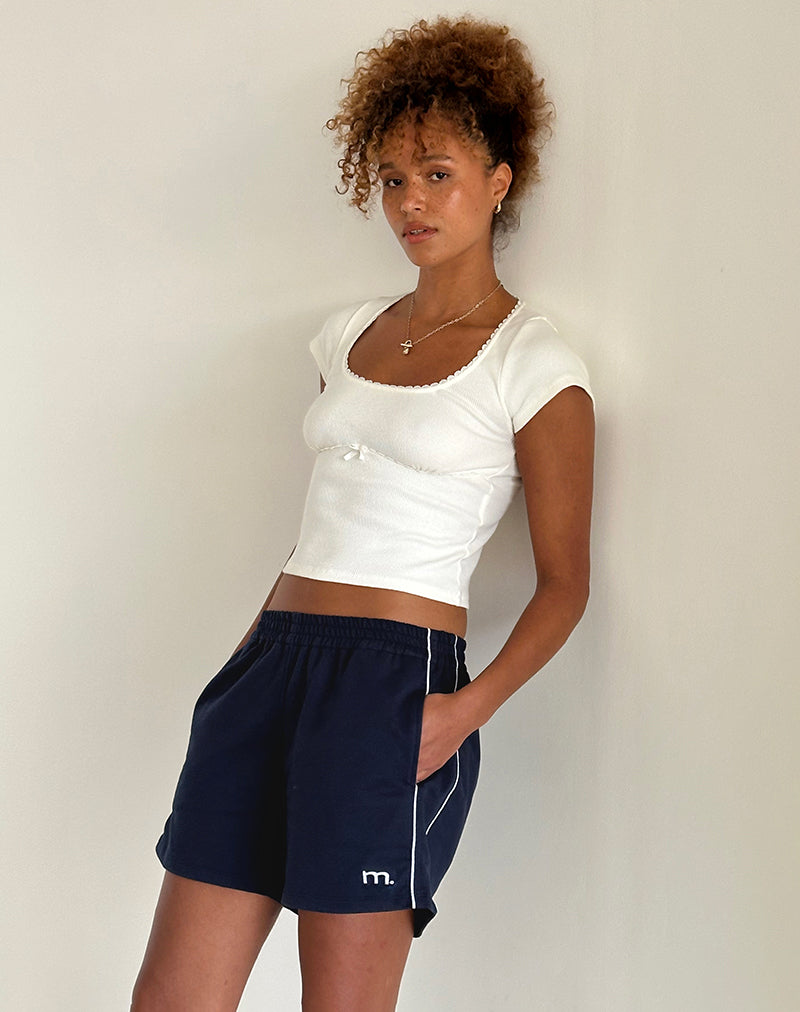 Thera Short in Navy with White Piping with M Emb